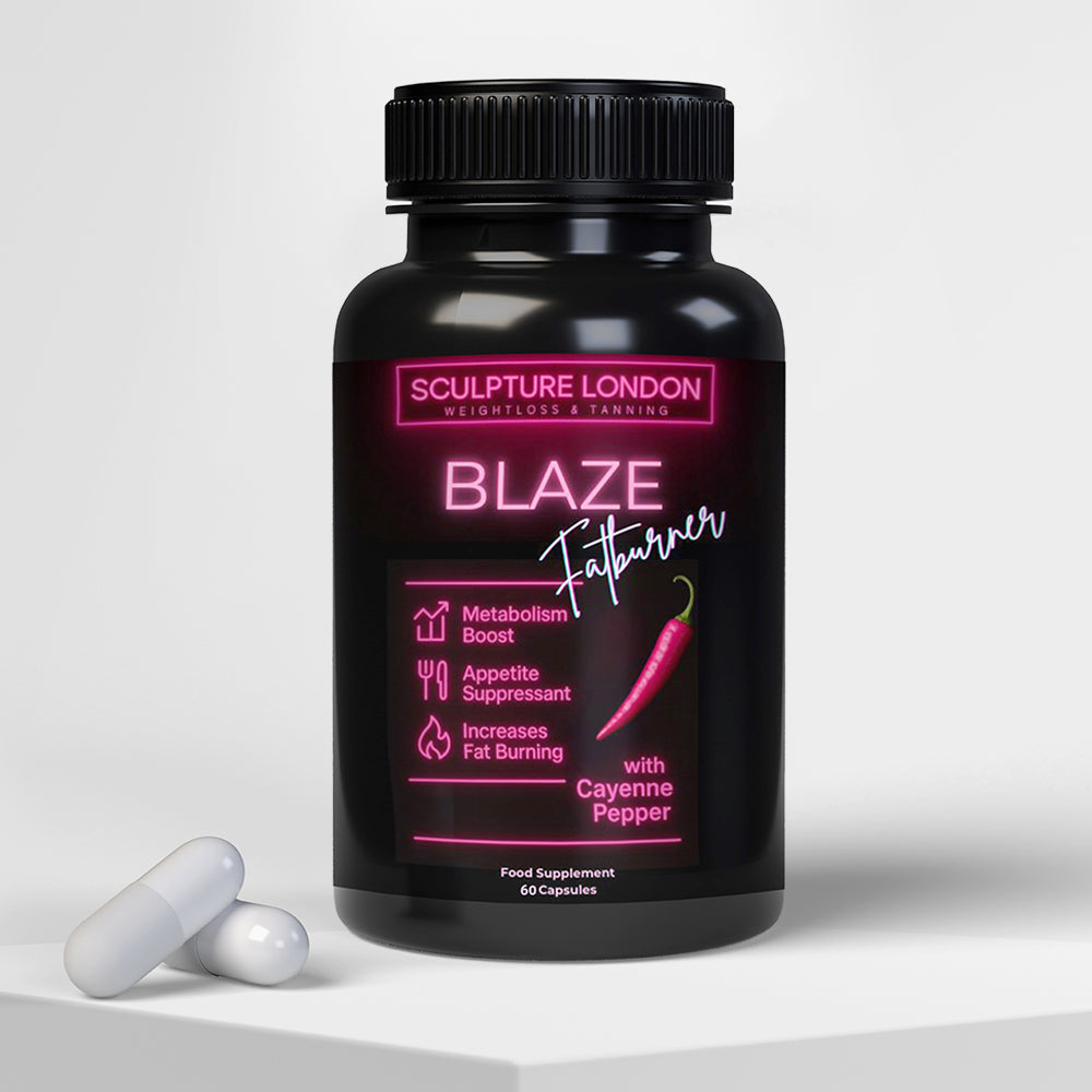 Black supplement bottle labeled 'Sculpture London Blaze Fatburner' with two white capsules on a light gray background.